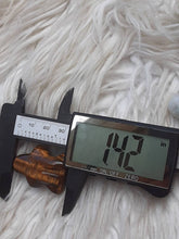 One Tiger eye  Ghost around 1.3 inch Tall