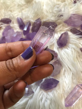 One Gemmy Amethyst  Double Terminated Point less than 2 inches