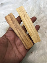 Two Palo santo sticks