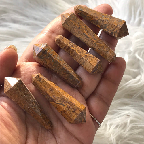 One Calligraphy stone Point around 2 inches