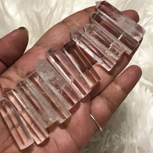One Clear quartz Point less than 2 inches