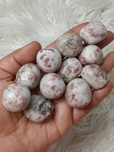 One Cinabrite tumbles