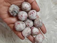 One Cinabrite tumbles