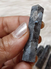 One larvikite pencil Point less than 2 inches