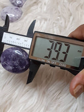 One lepidolite worry stone