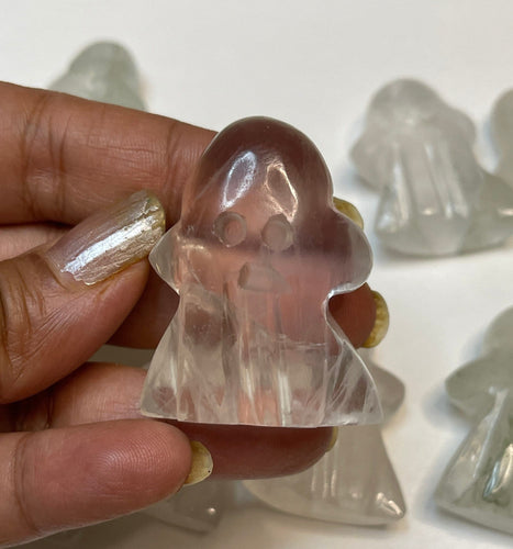 One clear Quartz  ghost 1.3 inch Tall