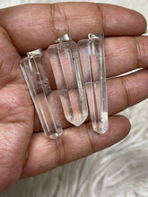 One Clear Quartz Pendant