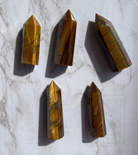One Flashy Tiger eye Point