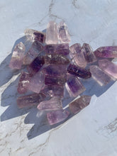 One mini Amethyst point From Brazil