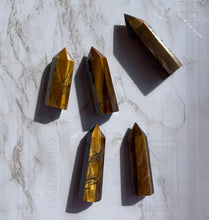 One Flashy Tiger eye Point