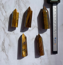 One Flashy Tiger eye Point
