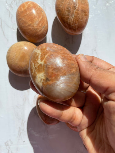 One Peach Moonstone Palm