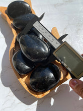 One Black tourmaline Palmstone